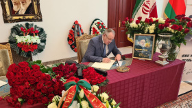 Chairman Mikhael Miatlikov makes an entry in the book of condolences in Iranian Embassy